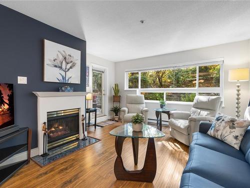 114-1685 Estevan Rd, Nanaimo, BC - Indoor Photo Showing Living Room With Fireplace