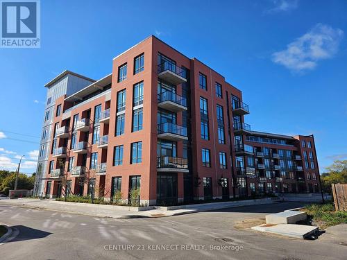 205 - 1010 Dundas Street E, Whitby, ON - Outdoor With Balcony With Facade