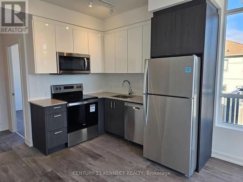 205 - 1010 Dundas Street E, Whitby, ON - Indoor Photo Showing Kitchen With Stainless Steel Kitchen