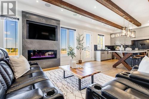 22 East John Street, Innisfil, ON - Indoor Photo Showing Living Room With Fireplace