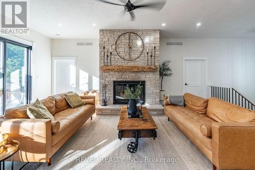 7404 Wellington Road 11 Road, Mapleton, ON - Indoor Photo Showing Living Room With Fireplace