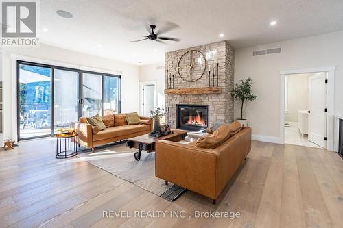 7404 Wellington Road 11 Road, Mapleton, ON - Indoor Photo Showing Living Room With Fireplace