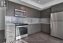 817 - 2550 Simcoe Street N, Oshawa, ON  - Indoor Photo Showing Kitchen With Stainless Steel Kitchen With Upgraded Kitchen 