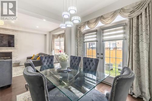 43 Military Crescent, Brampton, ON - Indoor Photo Showing Dining Room With Fireplace