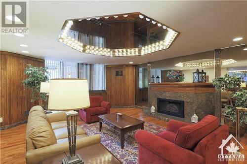 2871 Richmond Road Unit#603, Ottawa, ON - Indoor Photo Showing Living Room With Fireplace