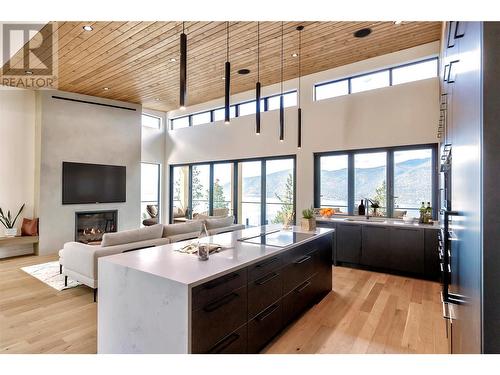 9436 Benchland Drive, Lake Country, BC - Indoor Photo Showing Other Room With Fireplace