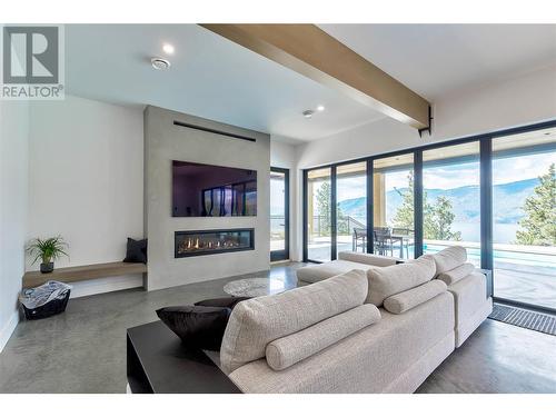 9436 Benchland Drive, Lake Country, BC - Indoor Photo Showing Living Room With Fireplace