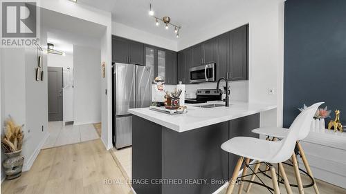 1407 - 225 Webb Drive, Mississauga, ON - Indoor Photo Showing Kitchen