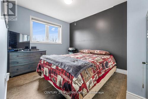 883 Lake Dalrymple Road, Kawartha Lakes, ON - Indoor Photo Showing Bedroom