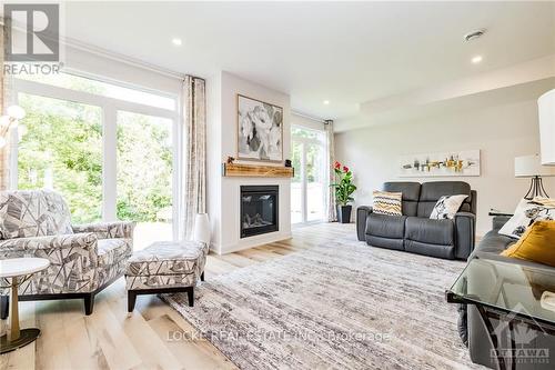 31 Marcel Street, Russell, ON - Indoor Photo Showing Living Room With Fireplace