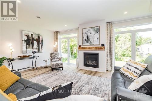 31 Marcel Street, Russell, ON - Indoor Photo Showing Living Room With Fireplace