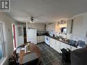 7511 Highland Drive, Fort Nelson, BC  - Indoor Photo Showing Kitchen With Double Sink 