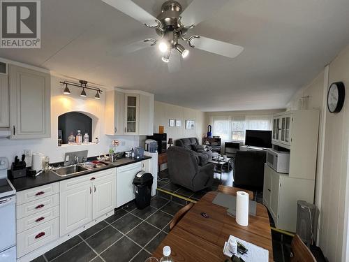 7511 Highland Drive, Fort Nelson, BC - Indoor Photo Showing Kitchen With Double Sink