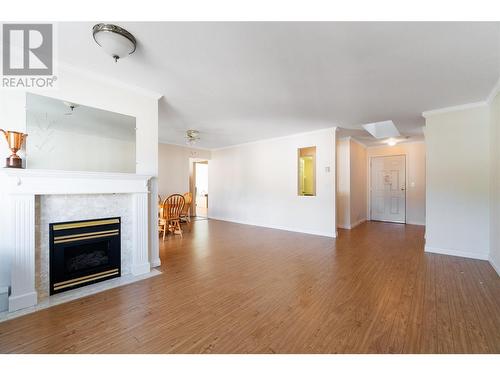 250 5 Street Se Unit# 307, Salmon Arm, BC - Indoor Photo Showing Living Room With Fireplace