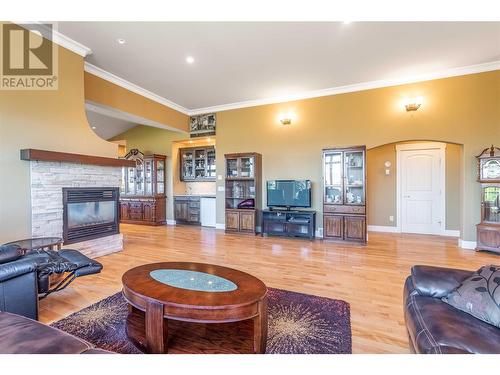 5016 Seon Crescent, Kelowna, BC - Indoor Photo Showing Living Room With Fireplace