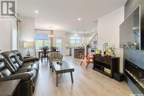 487 Mcfaull Crescent, Saskatoon, SK - Indoor Photo Showing Living Room With Fireplace