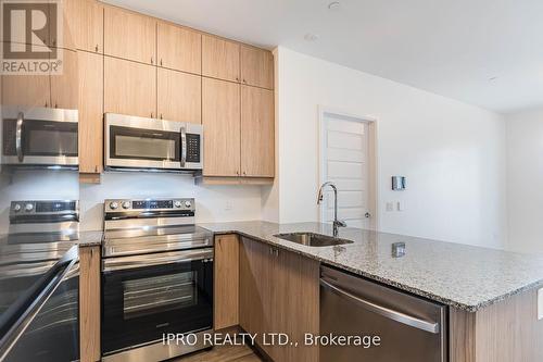 323 - 460 Gordon Krantz Ave. Road, Milton, ON - Indoor Photo Showing Kitchen