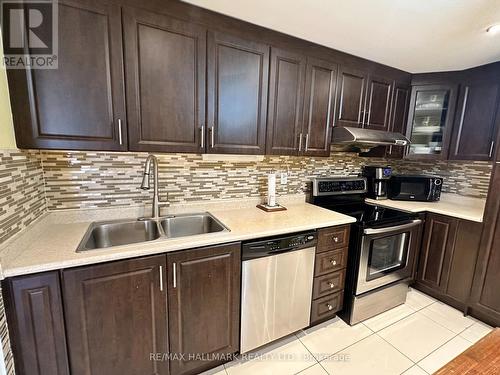 1613 - 370 Dixon Road, Toronto, ON - Indoor Photo Showing Kitchen With Double Sink