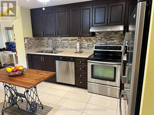 1613 - 370 Dixon Road, Toronto, ON - Indoor Photo Showing Kitchen With Stainless Steel Kitchen With Double Sink