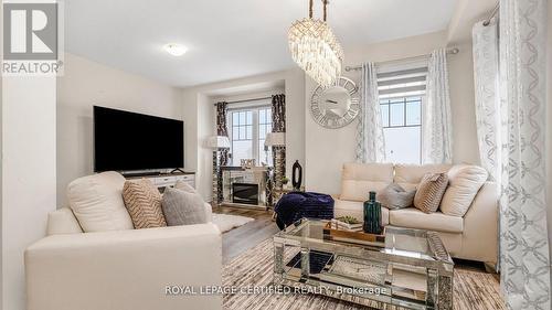 16 - 185 Bedrock Drive, Hamilton, ON - Indoor Photo Showing Living Room With Fireplace