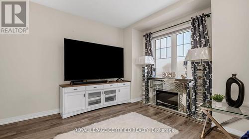 16 - 185 Bedrock Drive, Hamilton, ON - Indoor Photo Showing Living Room With Fireplace