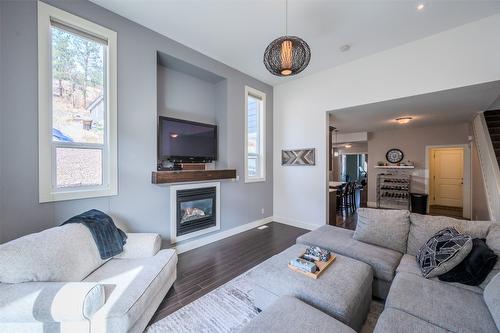 102-14395 Herron Road, Summerland, BC - Indoor Photo Showing Living Room With Fireplace