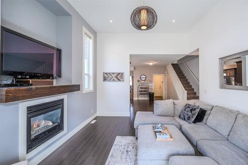 102-14395 Herron Road, Summerland, BC - Indoor Photo Showing Living Room With Fireplace