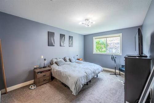 102-14395 Herron Road, Summerland, BC - Indoor Photo Showing Bedroom