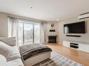 Salon - 303-1315 Rue Notre-Dame O., Montréal (Ville-Marie), QC  - Indoor Photo Showing Living Room With Fireplace 