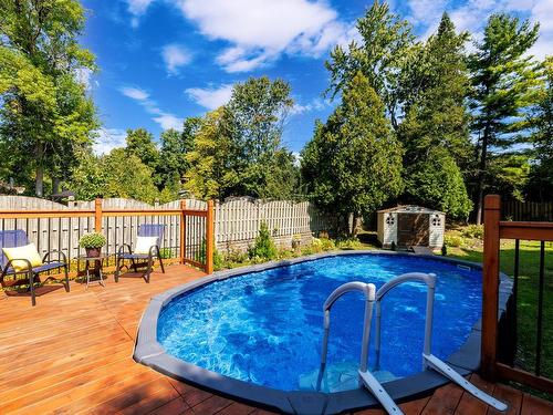 Piscine - 587 Ch. De La Rive-Boisée, Montréal (Pierrefonds-Roxboro), QC - Outdoor With Above Ground Pool With Backyard