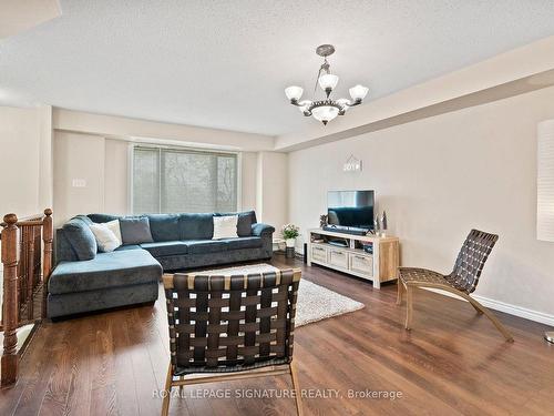 114-4950 Winston Churchill Blvd E, Mississauga, ON - Indoor Photo Showing Living Room