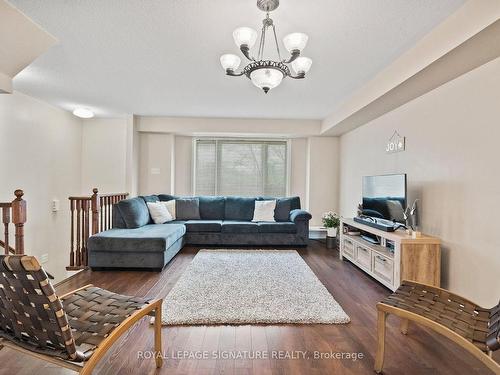 114-4950 Winston Churchill Blvd E, Mississauga, ON - Indoor Photo Showing Living Room