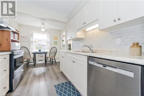 215 Scotland Street Unit# 306, Fergus, ON - Indoor Photo Showing Kitchen With Double Sink