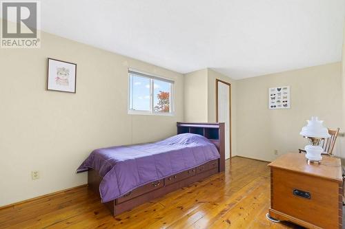 Bedroom 3 is sandwiched between the 2 other bedrooms.  It has only one window and a smaller closet. - 2176 County Road 22 Road, Cardinal, ON - Indoor Photo Showing Bedroom