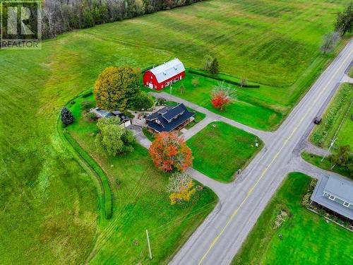 Another overhead photo showing the ornate landscaping, paved drive & neighbour's home accross the street. - 2176 County Road 22 Road, Cardinal, ON - Outdoor