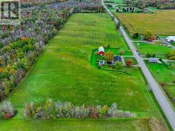 Looking north from near south property line.   Property extends south approximately 175 ft from tree line in lower part of photo almost to south neighbour's home. - 