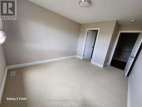 bedroom (2nd floor) walk-in closet - 1976 Wateroak Drive, London, ON - Indoor Photo Showing Other Room