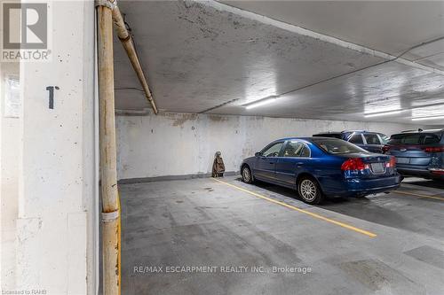 702 - 21 East Avenue S, Hamilton, ON - Indoor Photo Showing Garage