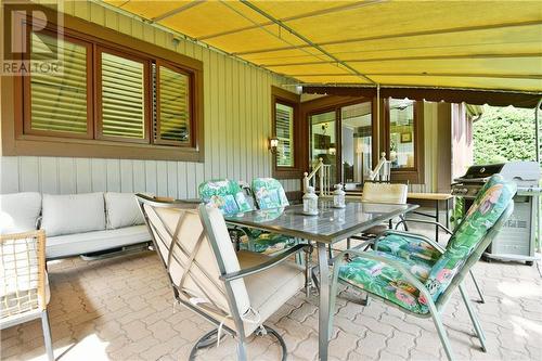 The interlocking patio is an extension of your home for those summer BBQ's and family gatherings. The canopy is removable but so great on the hot days! - 8 Spyglass Ridge, Stittsville, ON - Outdoor With Deck Patio Veranda With Exterior