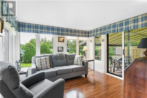 Wonderful sunroom leading out to the patio - 8 Spyglass Ridge, Stittsville, ON - Indoor Photo Showing Living Room