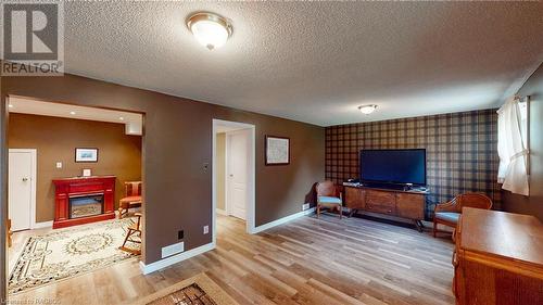 63 Greyview Drive, Markdale, ON - Indoor Photo Showing Other Room With Fireplace