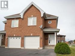 Beautiful 2 story semi detached home with attached garage and 4 additional parking spaces. - 