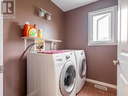 Second level laundry room. - 