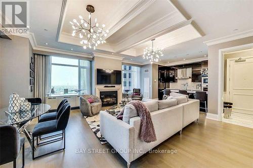 3703 - 311 Bay Street, Toronto, ON - Indoor Photo Showing Living Room With Fireplace