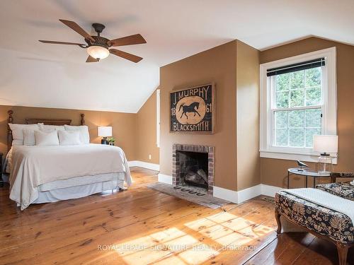 8268 Canyon Rd, Milton, ON - Indoor Photo Showing Bedroom With Fireplace