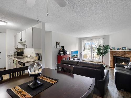 408-3270 Ross Rd, Nanaimo, BC - Indoor Photo Showing Living Room With Fireplace