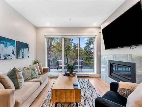 305-1820 Maple Ave South, Sooke, BC - Indoor Photo Showing Living Room With Fireplace