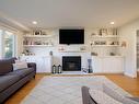 Salon - 142 Av. Willowbank, Pointe-Claire, QC  - Indoor Photo Showing Living Room With Fireplace 