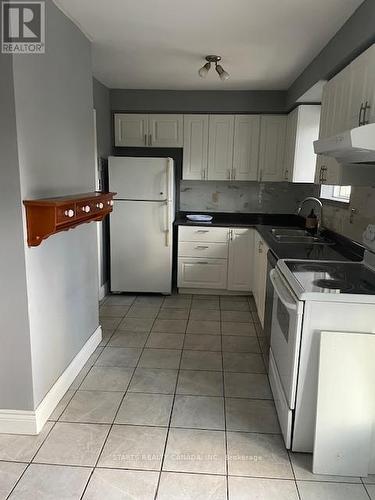 91 Scenic Mill Way, Toronto, ON - Indoor Photo Showing Kitchen With Double Sink