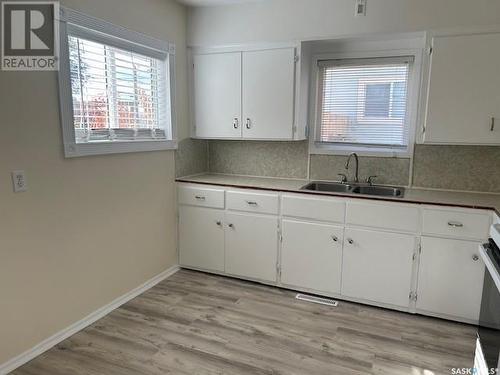 1021 Ominica Street E, Moose Jaw, SK - Indoor Photo Showing Kitchen With Double Sink